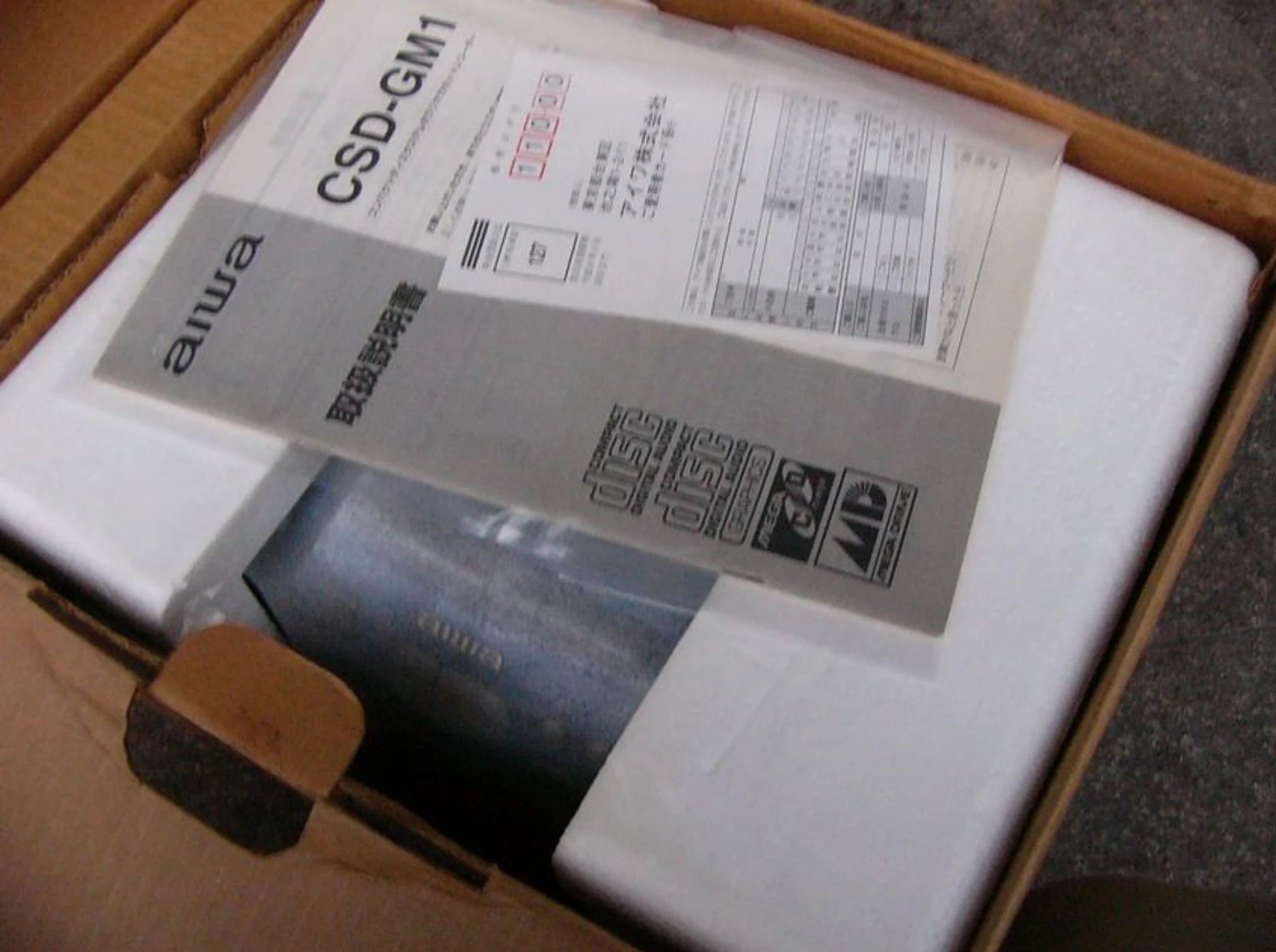 Console Aiwa CSD-GM1 in its original box brand new for retro gaming players and collectors on RetroPixl