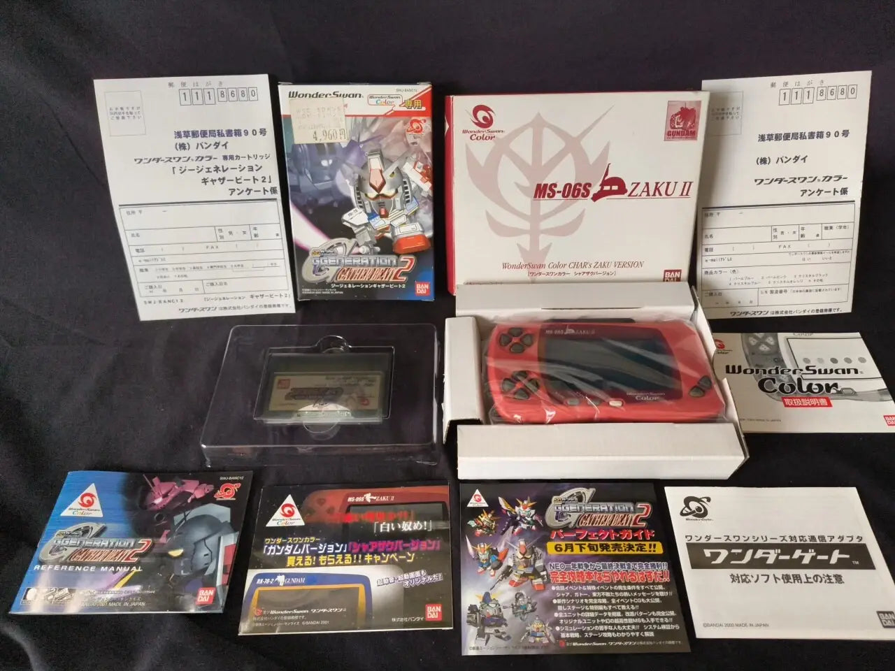 Bandai Wonderswan Color limited edition collector Gundam Gundam MS-065 Zaku II box contents for retro gaming players and collectors on RetroPixl