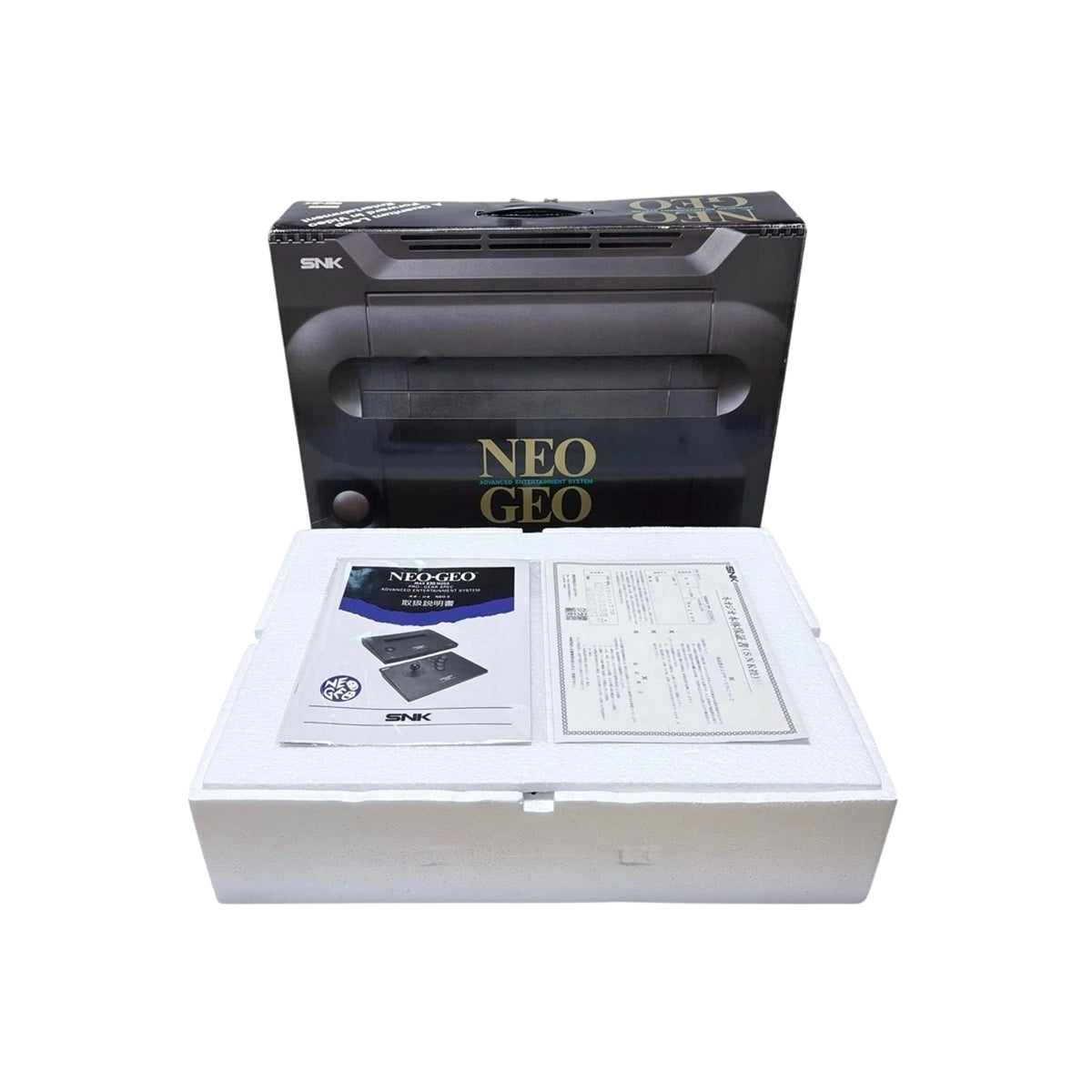 SNK Neo Geo AES console box contents front side on Retropixl.com for retrogaming players and retro gaming collectors