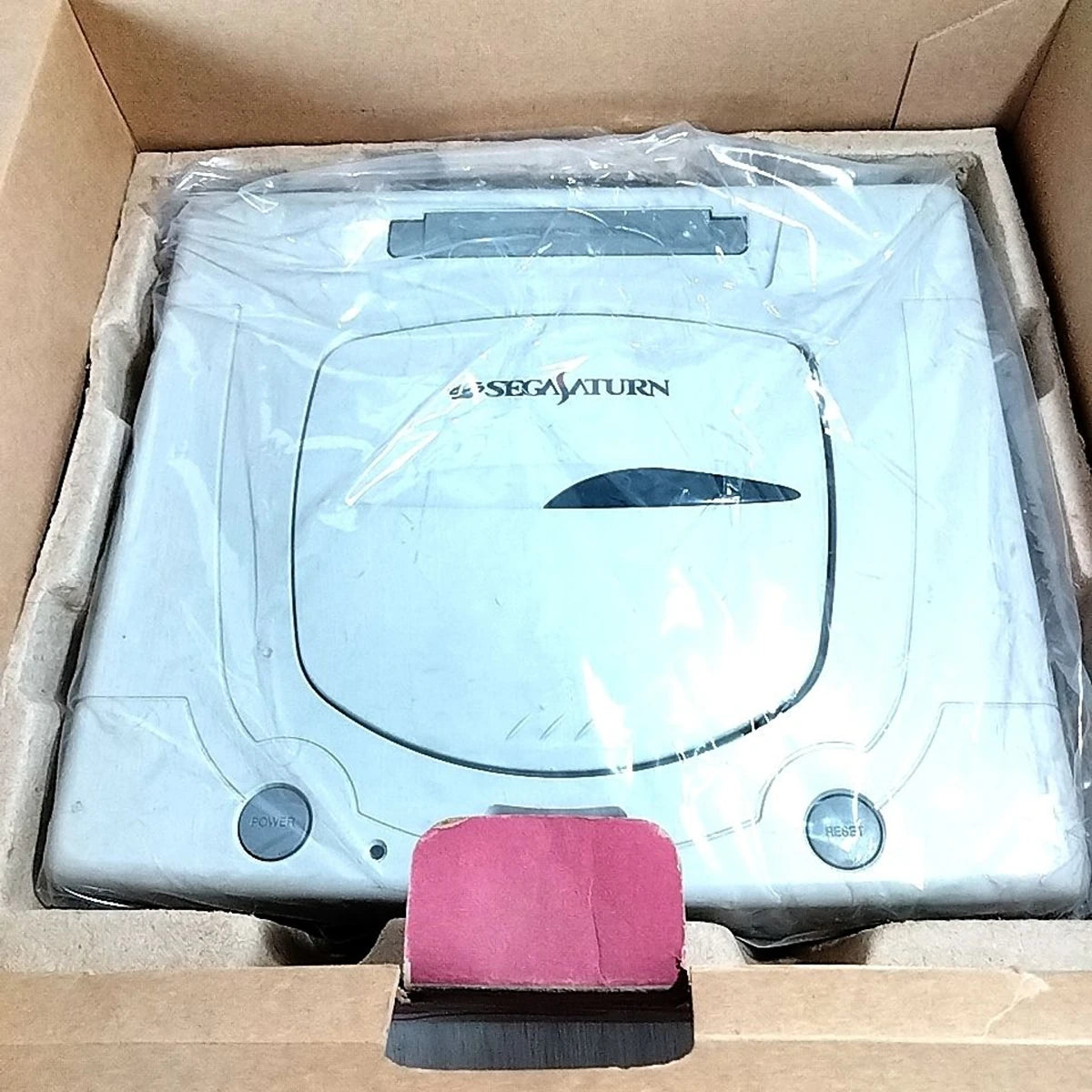 White Sega Saturn HST-0014 console in box on Retropixl.com for retrogaming players and retro gaming collectors