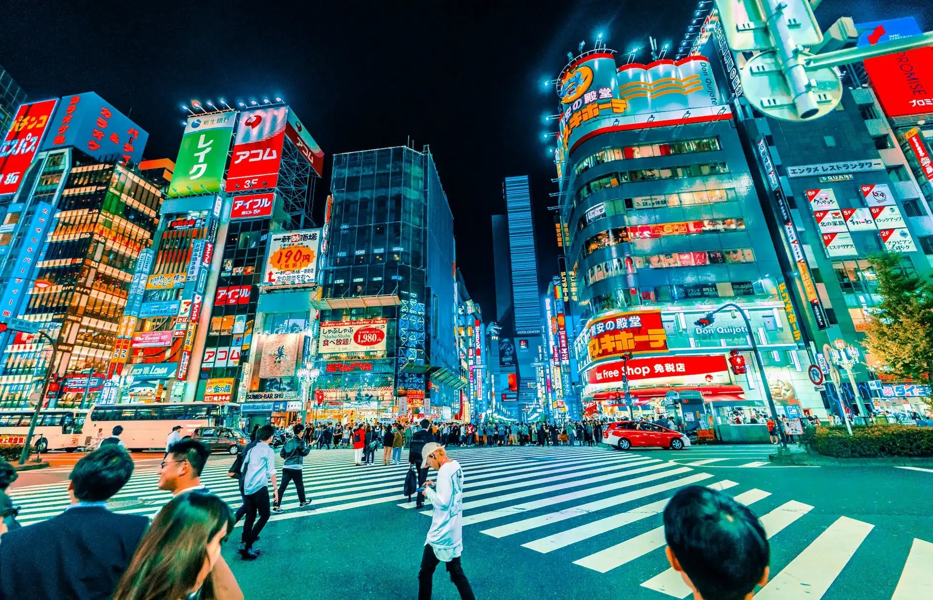 Shinjuku Tokyo city street at night, symbolizing RetroPixl’s Japanese roots and connection with retro gaming culture.